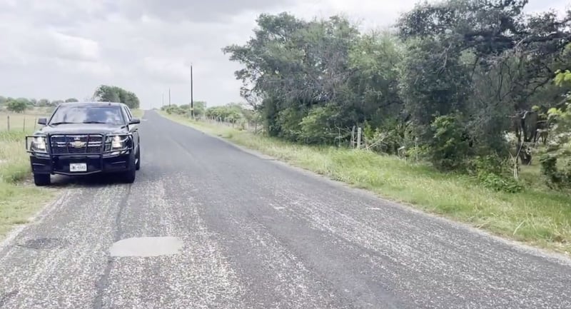 Joshua Sandoval was lying on the side of a country road