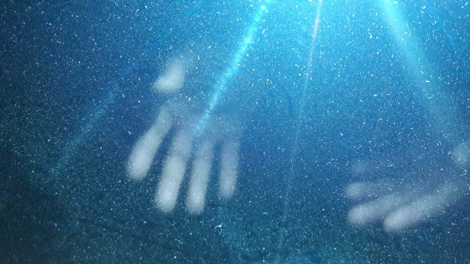 Hands in a sky with stars