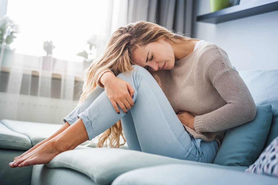 Woman with pain due to a possible STI
