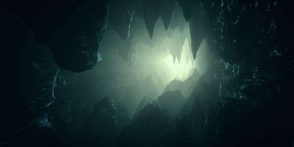 Interior de una cueva con un poco de luz