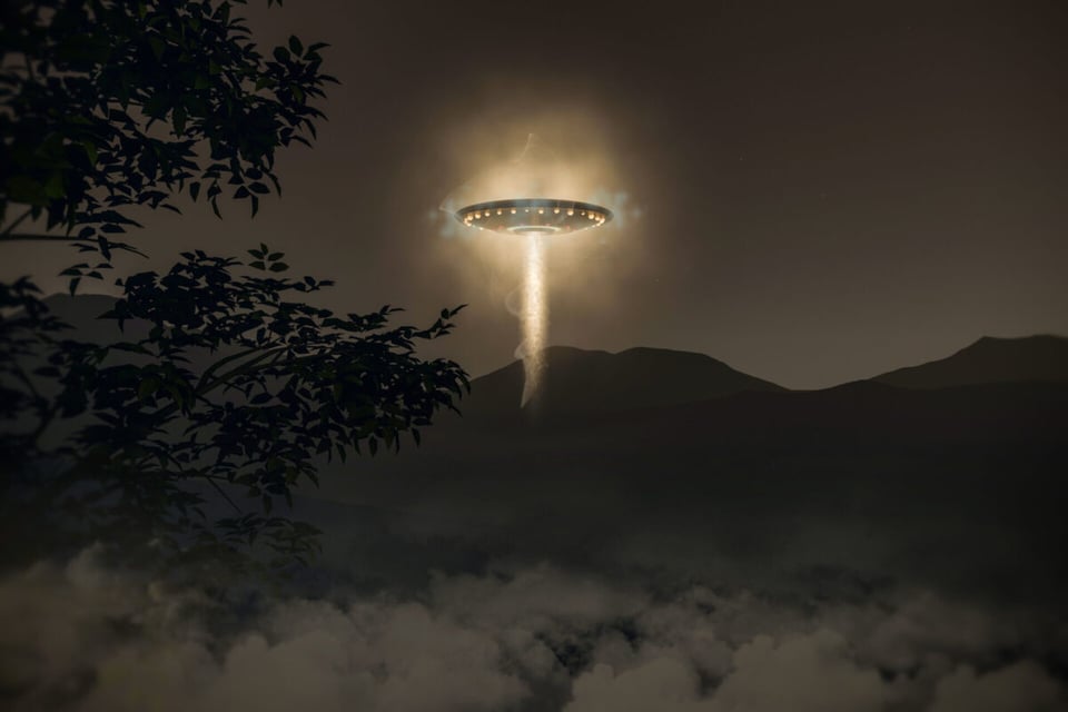 UFO flying near mountains
