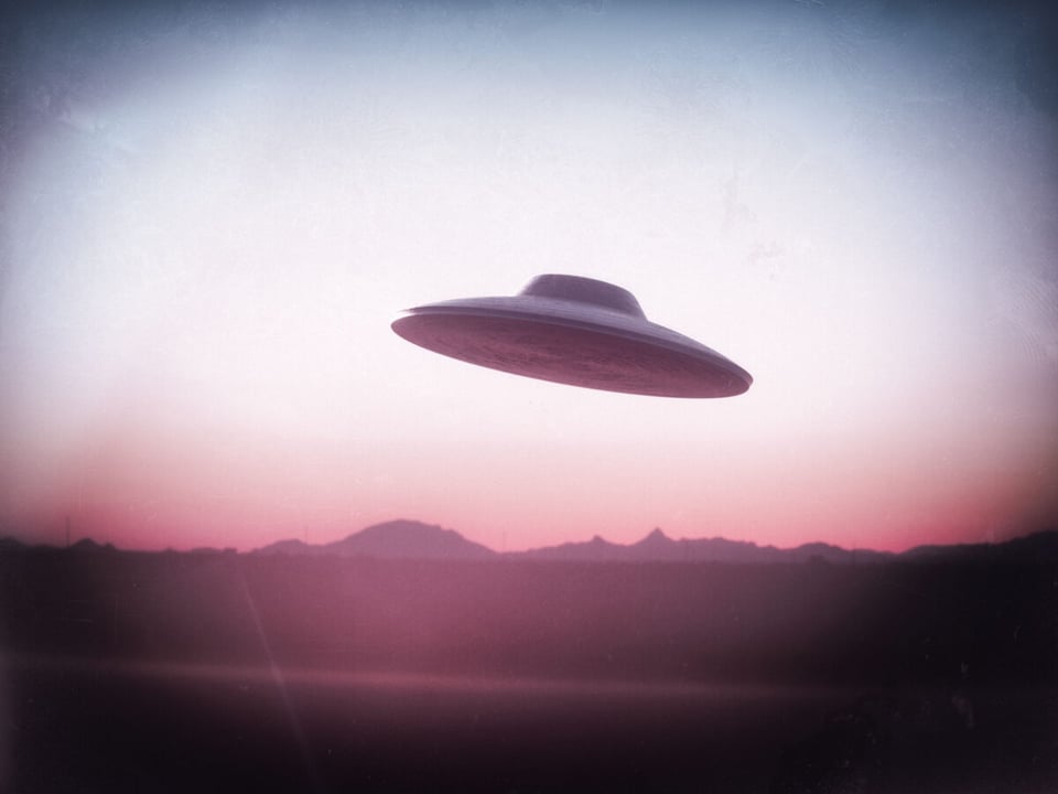 UFO flying on the desert
