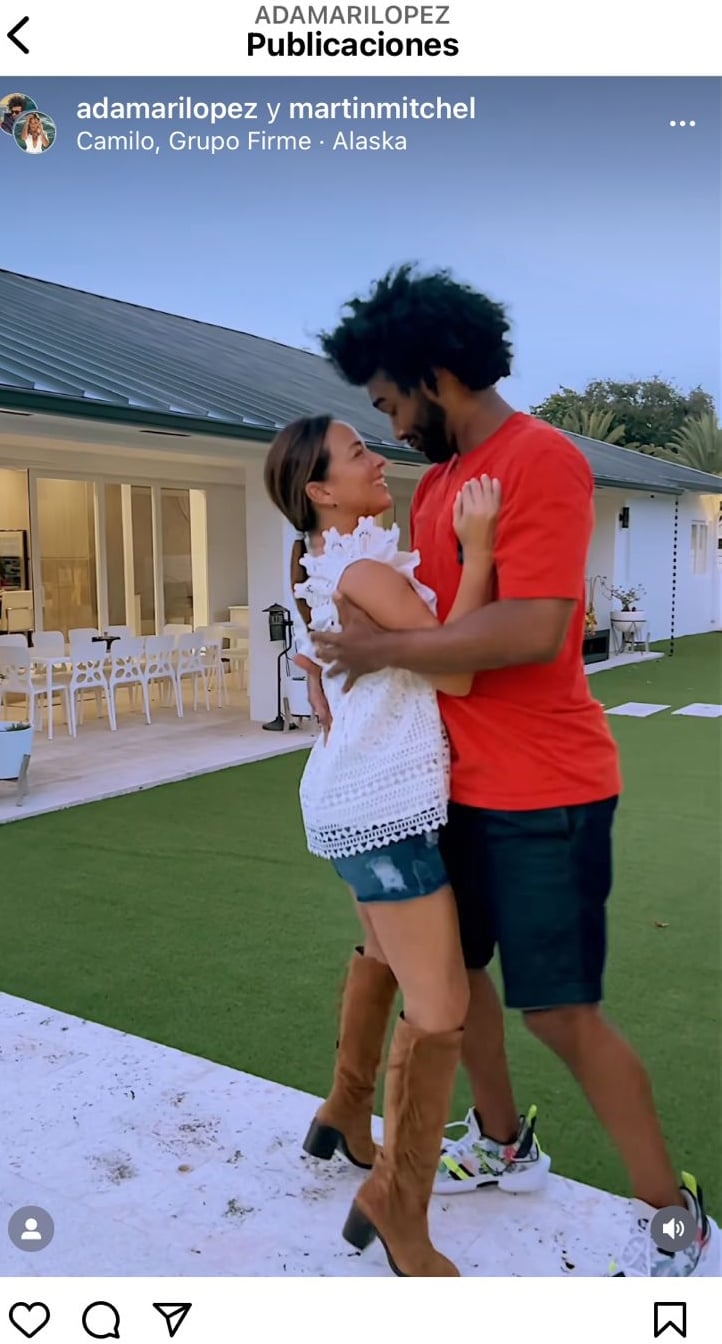 Adamari kisses a man