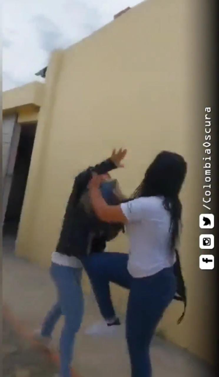 Woman reacts to the screams and blows after discovering that her husband is cheating on her with another woman in a hotel