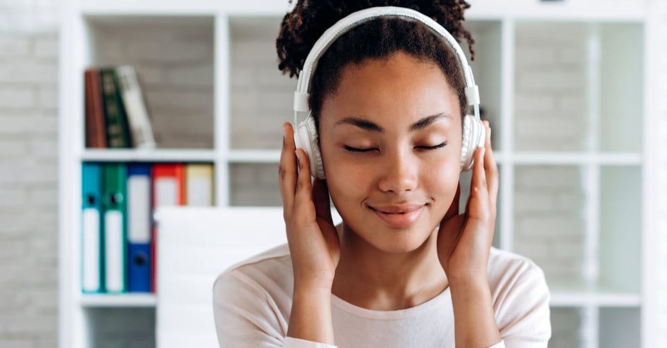 Girl listening to songs to fight anxiety