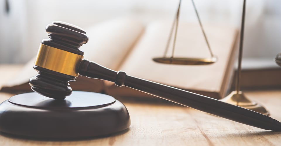 A hammer along with scales as a concept of judgment for criminal