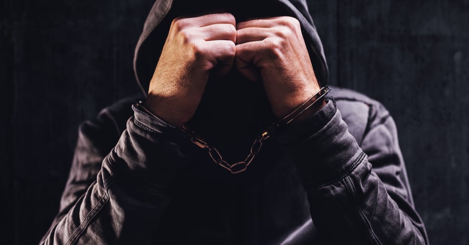 A murderer with handcuffs