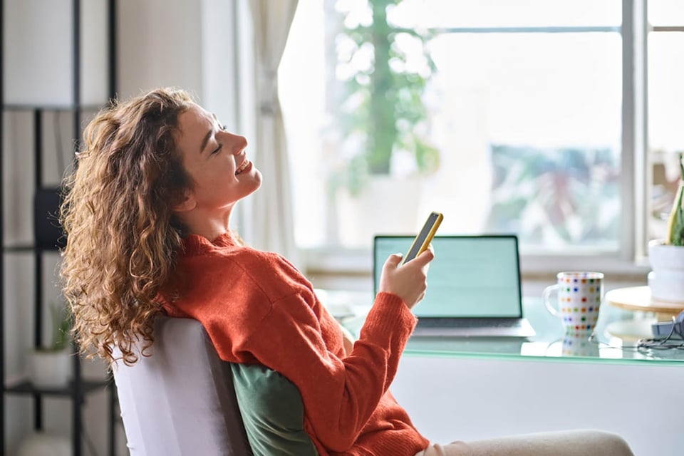 Young, smiling, pretty woman, smartphone, work